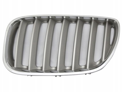 Acceder a la pieza Rejilla izquierda frente, cromada